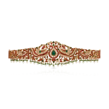 Decorative gold and red embellished headpiece with green gemstones and intricate designs.