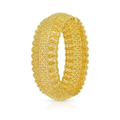 Gold bangle with intricate woven design and textured surface.