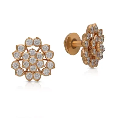 Gold floral stud earrings adorned with sparkling clear stones.