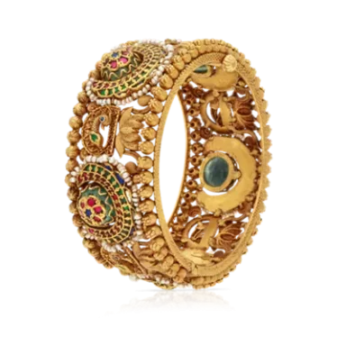 Intricately designed gold bangle featuring colourful embellishments and delicate patterns.