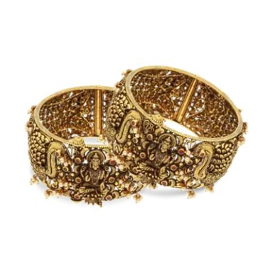 Two intricately designed gold bangles with floral patterns and embellishments.