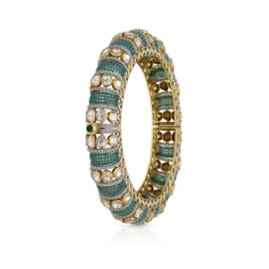 Elegant gold bangle adorned with green gemstones and pearls.