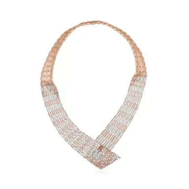 A delicate, intertwined ribbon necklace in soft peach and white hues.