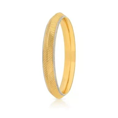 Yellow gold bangle with a textured design and a smooth silver band.