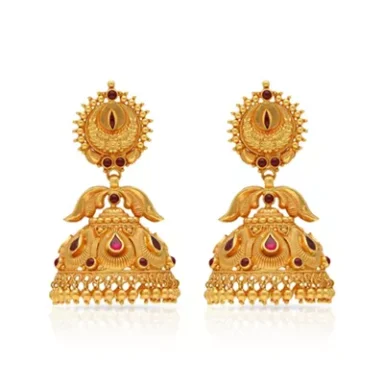 Gold earrings with intricate designs and red gemstones.