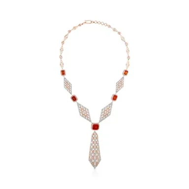 Elegant necklace featuring rose gold, red stones, and intricate geometric design.