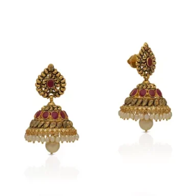 Gold earrings with red gemstones and intricate detailing.