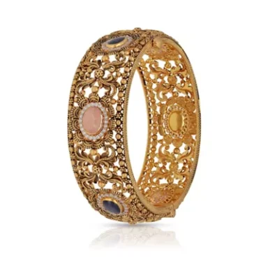 Gold filigree bangle adorned with multicoloured stones.