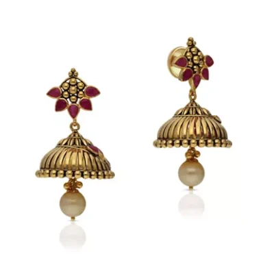 Gold earrings with a floral design and dangling pearls.