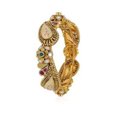 Gold ornamental bangle with intricate designs and colourful gem accents.