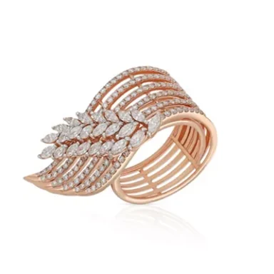 Rose gold bracelet featuring a leaf design adorned with sparkling clear stones.